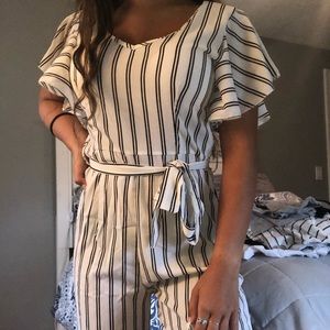 white and black jump suit